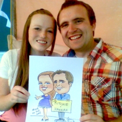 Couple holding caricature sketch